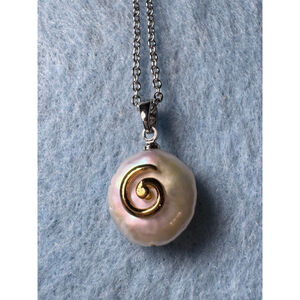 Pearl necklace on stainless steel chain with gold spiral design
